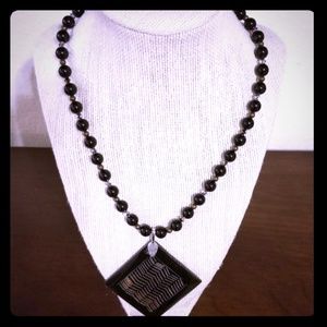 Unique -Onyx, Swarovski, and a bone pendant!